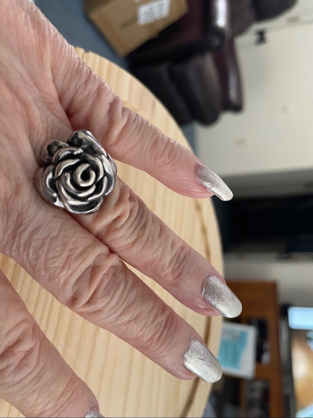 Sterling silver rose motif ring